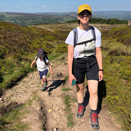 Slimming World member Cheri Mawson hiking up a hill