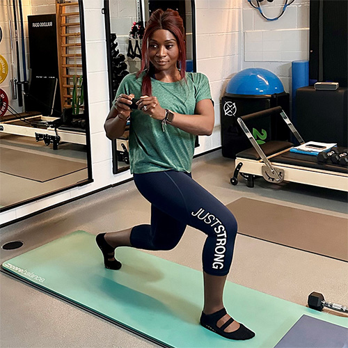 Slimming World member Elsie Perks building strength on her yoga mat