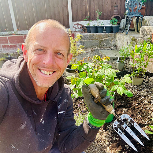Slimming World member Andrew gardening