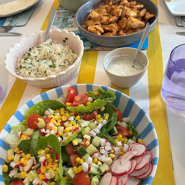 Slimming World member Shell's fajita spread on a yellow and white table.