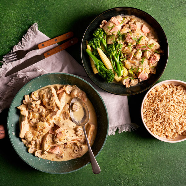 Creamy garlicky chicken served with broccoli and baby sweetcorn with a serving of rice